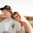 Bride In Tulle A-Line Wedding Dress Called Lorraine Lane Marie By Rebecca Ingram With Groom In Tan