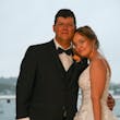 Bride wearing Florence wedding dress by Maggie Sottero with her husband