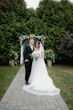 Bride Wearing Lace Princess Dress Called Harlem By Maggie Sottero With Groom