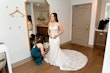 Bride Wearing Lace Fit And Flare Wedding Dress Called Fairchild By Maggie Sottero Getting Ready With A Bridesmaid