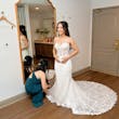 Bride Wearing Lace Fit And Flare Wedding Dress Called Fairchild By Maggie Sottero Getting Ready With A Bridesmaid