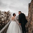 Bride In Lace Wedding Dress Called Mallory Dawn By Maggie Sottero With Illusion Lace Back With Groom