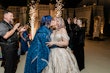 Bride Wearing Jaquard Wedding Dress Called Derrick Marie By Maggie Sottero Kissing Her Partner