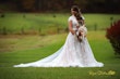 Bride wearing Kingsley wedding gown by Sottero and Midgley