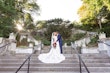 Bride wearing Ulanda wedding dress by Maggie Sottero kissing husband