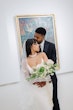 Bride wearing Moon by Maggie Sottero with her husband