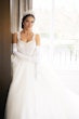 Bride Wearing Princess Ballgown Called Elton By Sottero And Midgley By A Window