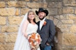 Bride Wearing Sparkly Aline Wedding Dress Called Anniston By Maggie Sottero With Groom In A Cowboy Hat