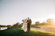 Bride Wearing Nature Lace Wedding Dress Called Albany By Maggie Sottero With Groom At A Golf Course