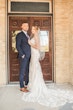 Bride Wearing Glamorous Lace And Sequin Wedding Dress Called Tuscany By Maggie Sottero With Groom And Simple Veil