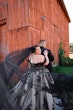 Bride Wearing Black Ballgown Norvinia By Sottero And Midgley