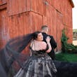 Bride Wearing Black Ballgown Norvinia By Sottero And Midgley