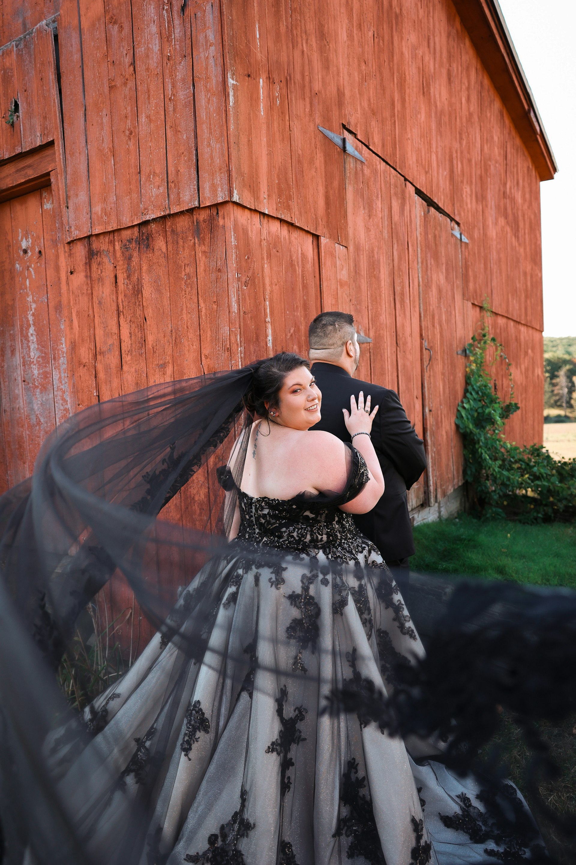 Bride Wearing Black Ballgown Norvinia By Sottero And Midgley