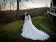 Bride wearing Seneca wedding dress by Sottero and Midgley with her husband