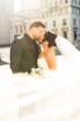 Bride Wearing Modern Ballgown Wedding Dress Called Aspen By Sottero And Midgley Kissing Groom