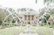 Bride In Elegant Floral Wedding Dress Called Cruz By Sottero And Midgley With Fountains And Mansion