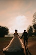 Bride In Tiered Ballgown Yasmin Maggie Sottero With Groom