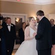 Real Bride In Ruffled Wedding Dress Called Fatima By Maggie Sottero With Groom During Reception