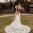Bride wearing wedding dress called Marlow with keyhole back.