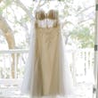 A-line Bridal Dress Ainsleigh By Rebecca Ingram Hanging From A Window
