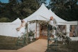 Bride wearing Lorraine by Rebecca Ingram sitting by her husband