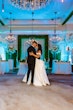 Bride wearing Zinaida by Maggie Sottero dancing with her husband