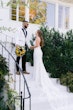 Bride In Lace Crepe Wedding Dress Called Baxley By Rebecca Ingram With Groom