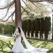 Bride wearing Hattie Lynette wedding dress by Rebecca Ingram