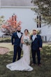 Bride wearing budget friendly fit and flare wedding dress