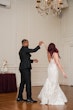 Bride wearing Bailey by Sottero and Midgley dancing with her husband