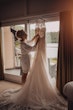 Real Bride wearing rustic boho lace wedding dress called Kendall by Maggie Sottero.