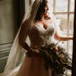 Bride In Beaded And Chiffon Wedding Dress Called Savannah By Maggie Sottero