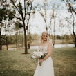 Bride Wearing Wedding Dress Called Raelynn by Rebecca Ingram