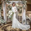 Bride Wearing Modest Lace Wedding Dress Called Tuscany Leigh By Maggie Sottero