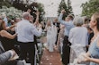 Confetti throw and cheering as the couple are now wed.
