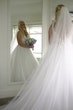 Bride In Lace A-Line Wedding Dress Called Taylor By Maggie Sottero With Long Veil