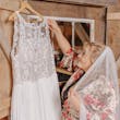 Wedding Dress Called Tasha By Rebecca Ingram Hanging With Bride In Pierce By Maggie Sottero Veil