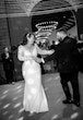 Groom Dancing With Bride In A White Mermaid Wedding Gown Named Nikki By Maggie Sottero