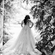 Back view of bride wearing wedding dress called Valona.