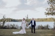 Bride with groom wearing budget friendly fit and flare wedding dress