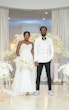 Bride Wearing Simple Fit and Flare Wedding Dress Called Anniston Lane With Groom