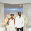 Bride Wearing Simple Fit and Flare Wedding Dress Called Anniston Lane With Groom