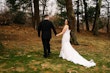 Bride In Lace Beaded Mermaid Wedding Dress Called January By Maggie Sottero With Groom