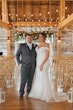 Bride Wearing Lace Beaded Wedding Dress Called Charmaine By Maggie Sottero With Groom In A Rustic Venue