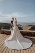 Bride wearing Aspen by Sottero and Midgley with her husband