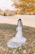 Bride Wearing Crepe Sheath Wedding Dress Called Alda By Rebecca Ingram