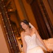 Bride Wearing Sheath and Beaded Wedding Dress Called Doritte By Maggie Sottero Sitting In Front Of A Mirror