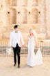 Bride In Crepe And Lace Wedding Dress Called Beverly By Rebecca Ingram With Groom