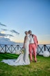 Bride In Boho Lace Wedding Dress Called Burke By Maggie Sottero With Groom In Pink