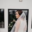 Bridal Portrait Wearing High Neck Halter Wedding Dress With Lace Motifs Called Kevyn By Sottero And Midgley